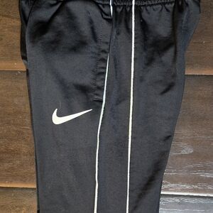 Nike Kids Black Joggers with White Swoosh